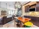 Open kitchen with a large farmhouse sink and dark wood cabinets at 1770 Gentry Ridge Rd, Roxboro, NC 27574