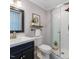 Bathroom featuring a glass-enclosed shower, vanity, and modern fixtures at 1813 Grady Dr., Durham, NC 27712