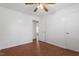 Bedroom with neutral-toned walls, laminate flooring, and a ceiling fan at 1813 Grady Dr., Durham, NC 27712