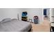 Bedroom featuring neutral carpet, white walls, and doorway to an adjacent room at 1824 Vintage Rd, Raleigh, NC 27610