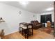 Bright living room and breakfast bar area with laminate floors and comfortable furniture at 1824 Vintage Rd, Raleigh, NC 27610