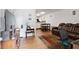 Open-concept living room showcases modern decor, laminate flooring, and a cozy seating area at 1824 Vintage Rd, Raleigh, NC 27610