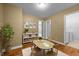 Cozy playroom or study area with a small table, ample storage, and a view of the laundry room at 2067 Glenkirk Dr, Burlington, NC 27215