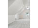 Bright attic area featuring carpet and a window to the outside at 209 Bailey Ridge Dr, Morrisville, NC 27560