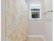 Bathroom area featuring a patterned shower curtain and window at 209 Bailey Ridge Dr, Morrisville, NC 27560