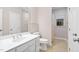 Bathroom featuring a vanity with chrome fixtures and floral shower curtain at 209 Bailey Ridge Dr, Morrisville, NC 27560