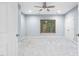 Cozy bedroom featuring a window, ceiling fan, and carpet at 209 Bailey Ridge Dr, Morrisville, NC 27560