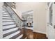 Grand entryway featuring a staircase and a glimpse into the formal dining room at 209 Bailey Ridge Dr, Morrisville, NC 27560