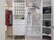 Walk-in closet with custom shelving and organization for ample storage of clothing and accessories at 209 Bailey Ridge Dr, Morrisville, NC 27560