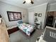 Comfortable bedroom with ceiling fan, natural light, and neutral color scheme at 2535 Kinglass Dr, Fuquay Varina, NC 27526