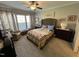 Comfortable bedroom with ceiling fan and natural light at 2535 Kinglass Dr, Fuquay Varina, NC 27526