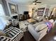 Comfortable living room with stylish furnishings, fireplace, and dark hardwood floors at 2535 Kinglass Dr, Fuquay Varina, NC 27526