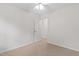 Bright bedroom with neutral carpeting, closet and access to another room at 2724 Glastonbury Rd, Apex, NC 27539