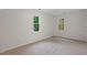 Bright bedroom with neutral carpeting and natural lighting at 2724 Glastonbury Rd, Apex, NC 27539