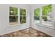 Sunny breakfast nook featuring garden views through a large picture window at 2724 Glastonbury Rd, Apex, NC 27539