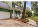 A green home featuring a white porch railing, and a purple front door at 2724 Glastonbury Rd, Apex, NC 27539