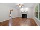The living room includes wood floors and a decorative fireplace at 2724 Glastonbury Rd, Apex, NC 27539