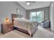 Comfortable bedroom with large window and neutral colors, creating a relaxing atmosphere at 3027 Courtney Creek Blvd, Durham, NC 27713