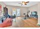 Versatile bonus room with wood floors, ceiling fan, French doors, and a modern exercise bike at 3027 Courtney Creek Blvd, Durham, NC 27713