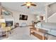 Spacious living room with open floor plan flowing into the dining area at 3027 Courtney Creek Blvd, Durham, NC 27713