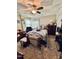 Comfortable bedroom with a ceiling fan and natural light from the windows at 304 Sandalwood Ave, Louisburg, NC 27549