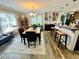A well-lit dining area connected to the kitchen and living spaces at 304 Sandalwood Ave, Louisburg, NC 27549