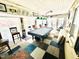 Spacious game room features bright lighting, billiard table with cover, and unique flooring at 304 Sandalwood Ave, Louisburg, NC 27549
