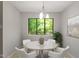Cozy dining room featuring a round table with comfortable seating and a view of nature at 3088 Colony Rd # A, Durham, NC 27705