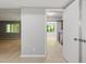 Bright hallway leading to kitchen, showcasing seamless flow and natural light at 3088 Colony Rd # A, Durham, NC 27705