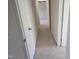 Hallway showcases new carpeting, neutral paint, and ample access to rooms at 309 Wyatts Pond Lane, Cary, NC 27513