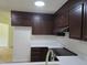 Kitchen featuring ample cabinets, a large countertop, and modern appliances at 309 Wyatts Pond Lane, Cary, NC 27513