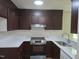 Well-equipped kitchen featuring stainless steel appliances and modern cabinetry at 309 Wyatts Pond Lane, Cary, NC 27513