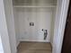 Convenient laundry closet with hookups and ample space for washer/dryer at 309 Wyatts Pond Lane, Cary, NC 27513