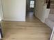 Spacious living room area features modern light wood floors and natural light at 309 Wyatts Pond Lane, Cary, NC 27513