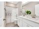 This bathroom has a double sink vanity, a tub, toilet and shower curtain at 31 Pascoli Ct, Clayton, NC 27527