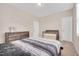 Bedroom with neutral walls, dresser, and a bassinet at 31 Pascoli Ct, Clayton, NC 27527