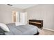 This bedroom has carpet, one window and a wood bed frame with a gray bed spread at 31 Pascoli Ct, Clayton, NC 27527