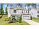 Aerial view of a home with a well-manicured lawn and bright blue front door at 31 Pascoli Ct, Clayton, NC 27527