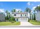 Beautiful two-story home with a well-kept lawn, a two-car garage, and a pleasant, manicured landscape at 31 Pascoli Ct, Clayton, NC 27527