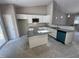 New kitchen with white cabinets, granite countertops and stainless steel appliances at 311 W Market St, Graham, NC 27253
