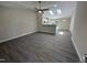 Bright and spacious living room boasts hardwood flooring and ample natural light at 311 W Market St, Graham, NC 27253