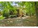 Expansive backyard with a wooden deck and screened in porch perfect for entertaining and relaxing at 3124 Briar Stream Run, Raleigh, NC 27612