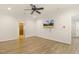 Large bedroom with hardwood floors and attached bath at 3124 Briar Stream Run, Raleigh, NC 27612