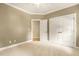 Bedroom featuring carpet, ceiling fan and closet at 3124 Briar Stream Run, Raleigh, NC 27612