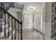 Spacious foyer with hardwood floors, white trim, and elegant double doors at 3124 Briar Stream Run, Raleigh, NC 27612