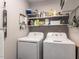 Well-lit laundry room with washer and dryer at 3600 Star Trek Ct, Raleigh, NC 27604