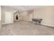 Spacious bonus room with soft carpet, featuring multiple windows and ample natural light at 40 Yellowstone Ct, Youngsville, NC 27596
