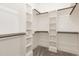 Walk-in closet with custom shelving and ample storage space at 40 Yellowstone Ct, Youngsville, NC 27596