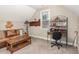 Comfortable living room featuring carpet, natural light, and an inviting space at 40 Yellowstone Ct, Youngsville, NC 27596