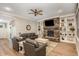 Spacious living room with built-in shelving, fireplace, and stylish decor at 40 Yellowstone Ct, Youngsville, NC 27596